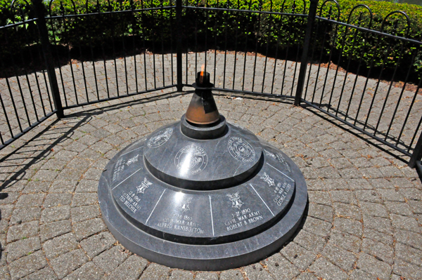 Air Force, Marine Corps, Coast Guard emblems on TheEternal Flame
